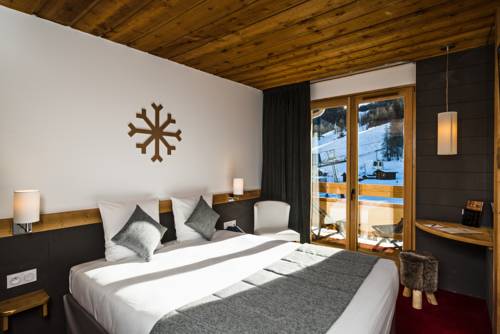 Imagen de la habitación del Hotel Marmotel & Spa. Foto 11