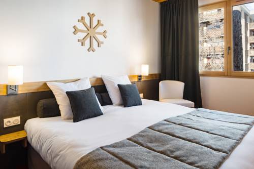 Imagen de la habitación del Hotel Marmotel & Spa. Foto 12