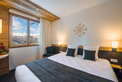 Imagen de la habitación del Hotel Marmotel & Spa. Foto 16