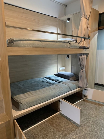 Imagen de la habitación del Hotel Marni BKK Hostel. Foto 11