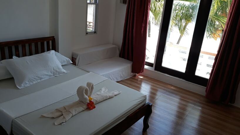 Imagen de la habitación del Hotel Marnin's Place Boracay. Foto 19