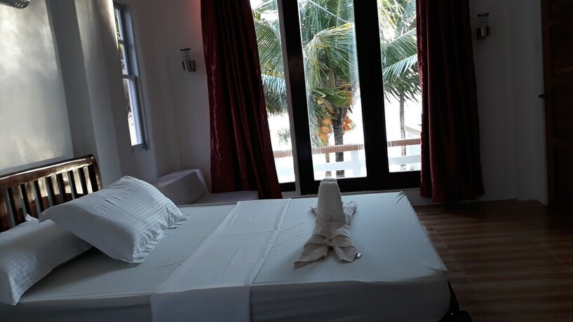 Imagen de la habitación del Hotel Marnin's Place Boracay. Foto 24