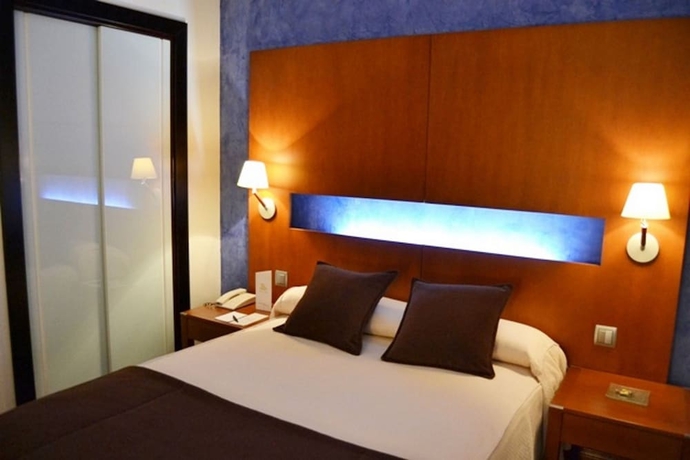 Imagen de la habitación del Hotel Maroa. Foto 16