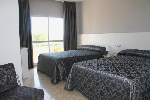 Imagen de la habitación del Hotel Marola. Foto 6