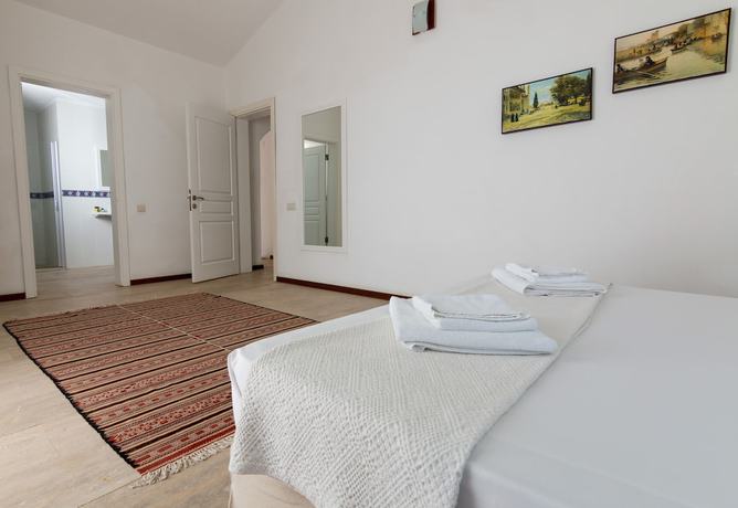 Imagen de la habitación del Hotel Marphe Suite and Villas. Foto 11