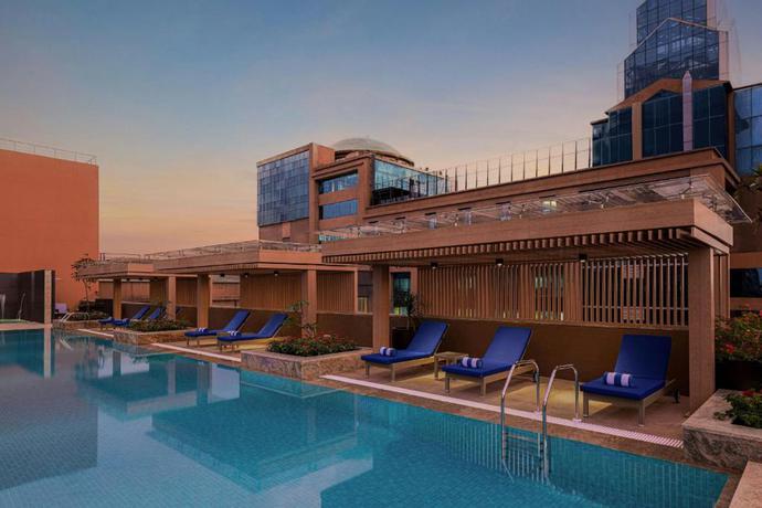 Imagen de la piscina del Hotel Marriott Executive Apartments Bengaluru UB City. Foto 37