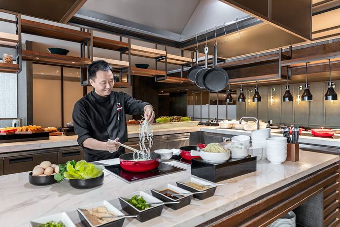 Imagen del bar/restaurante del Hotel Marriott Executive Apartments Chongqing. Foto 2