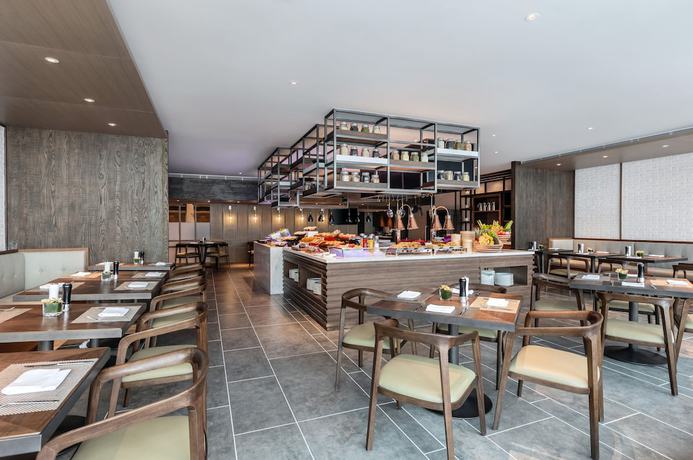 Imagen del bar/restaurante del Hotel Marriott Executive Apartments Chongqing. Foto 3