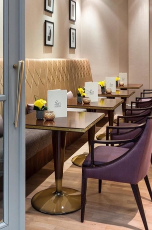 Imagen del bar/restaurante del Hotel Marriott Paris Opera Ambassador. Foto 5