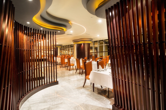 Imagen del bar/restaurante del Hotel Marriott Production City, Dubai. Foto 3