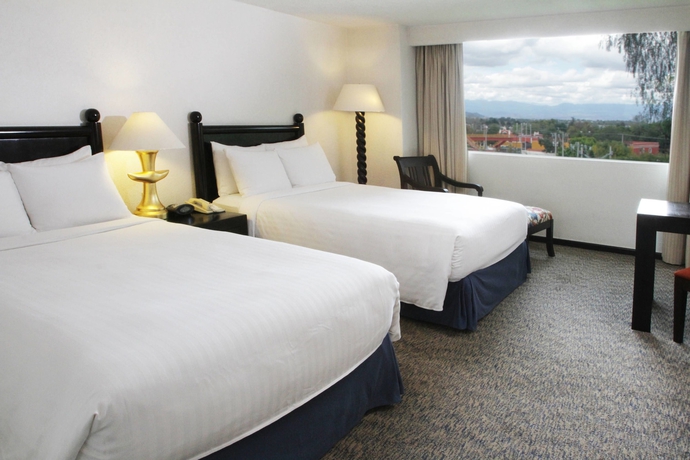 Imagen de la habitación del Hotel Marriott Puebla Meson Del Angel. Foto 5