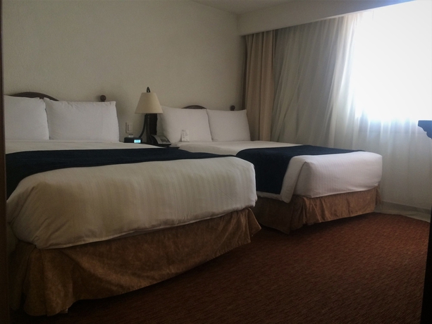 Imagen de la habitación del Hotel Marriott Puebla Meson Del Angel. Foto 6