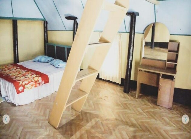 Imagen de la habitación del Hotel Marroan Guest House. Foto 11