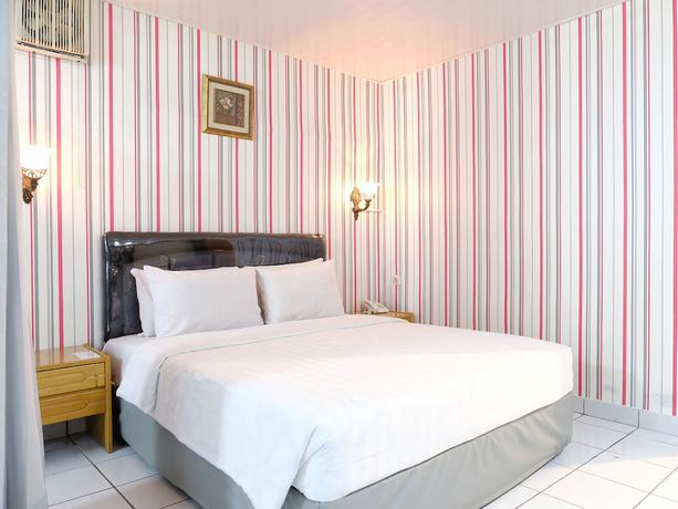 Imagen de la habitación del Hotel Martani. Foto 10