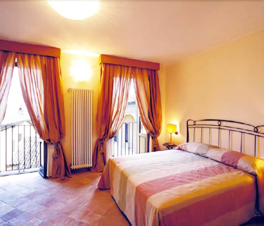 Imagen de la habitación del Hotel Martelletti. Foto 8