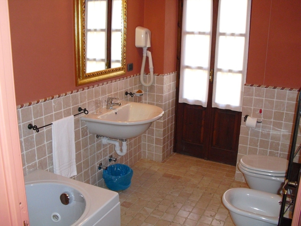 Imagen de la habitación del Hotel Martelletti. Foto 15