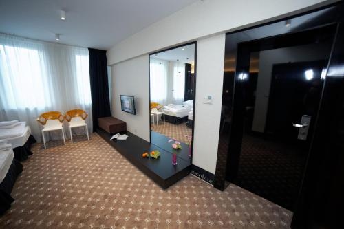 Imagen de la habitación del Hotel Martina, Żnin. Foto 6