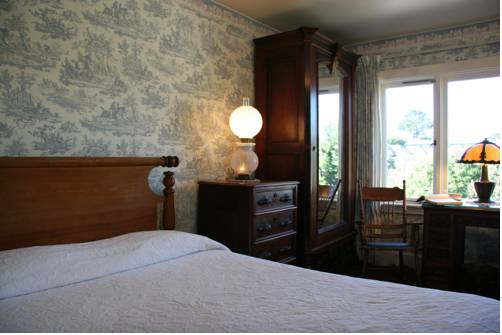Imagen de la habitación del Hotel Martine Inn. Foto 16