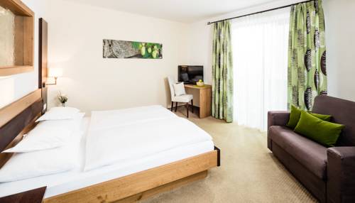 Imagen de la habitación del Hotel Martinerhof's Brauhotel. Foto 7