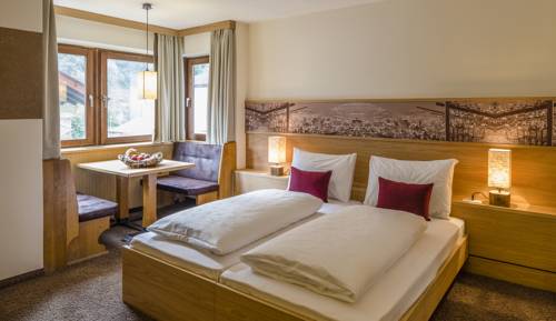 Imagen de la habitación del Hotel Martinerhof's Brauhotel. Foto 9