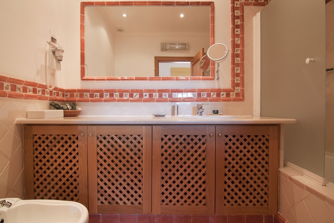 Imagen de la habitación del Hotel Martinhal Quinta Family Resort. Foto 14