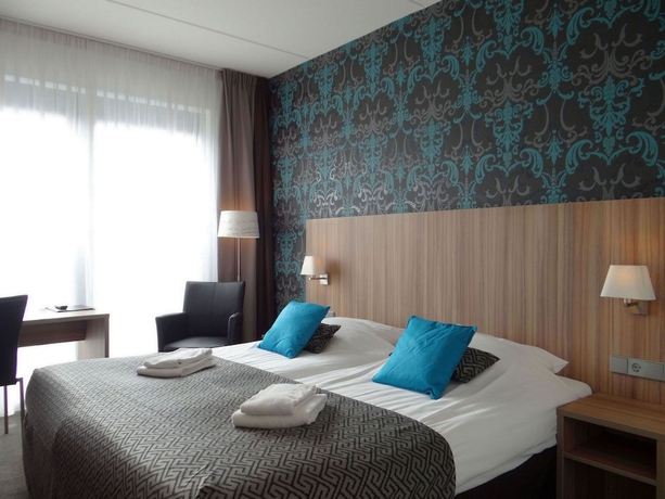 Imagen de la habitación del Hotel Martini, Groninga. Foto 10