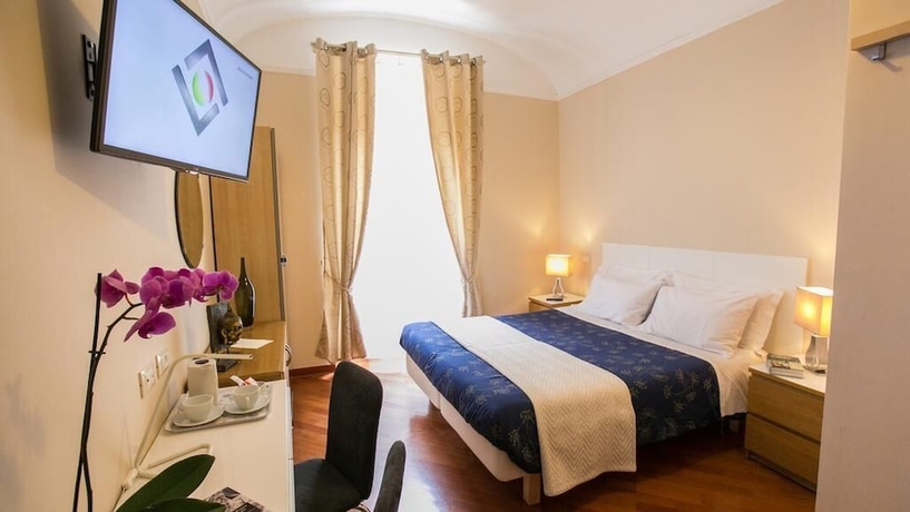 Imagen de la habitación del Hotel Martino Ai Monti. Foto 12