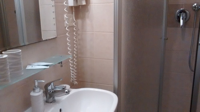 Imagen de la habitación del Hotel Martino Ai Monti. Foto 13