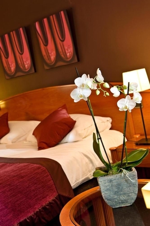 Imagen de la habitación del Hotel Martin's Château Du Lac. Foto 4