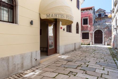 Imagen de la habitación del Hotel Martis Forum Heritage and Residence. Foto 5