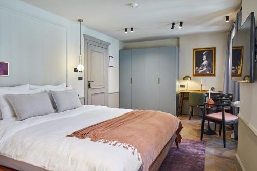 Imagen de la habitación del Hotel Martis Forum Heritage and Residence. Foto 9