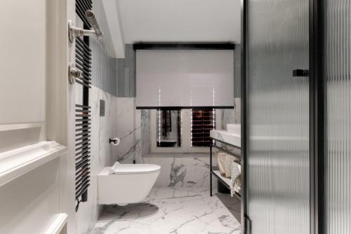 Imagen de la habitación del Hotel Martis Forum Heritage and Residence. Foto 11