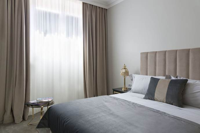 Imagen de la habitación del Hotel Martius Private Suites. Foto 11