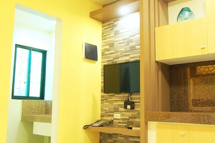 Imagen de la habitación del Hotel Marton Suites. Foto 21