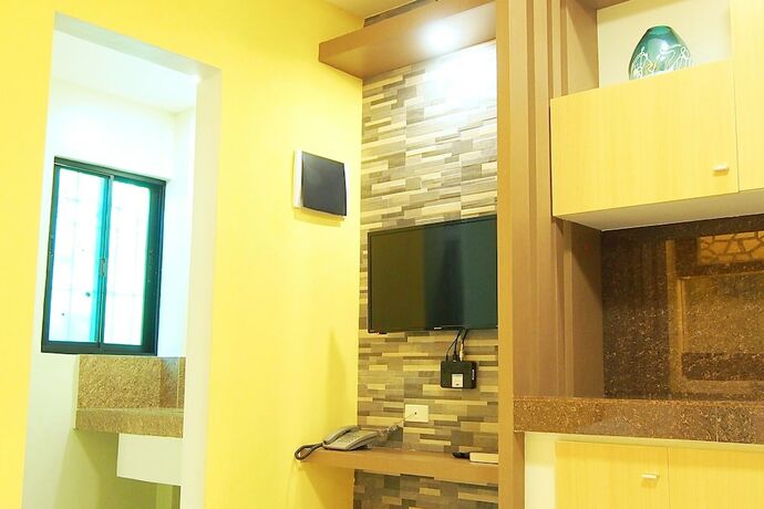 Imagen de la habitación del Hotel Marton Suites. Foto 23