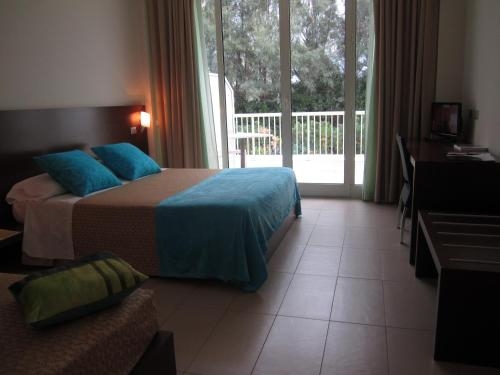 Imagen de la habitación del Hotel Martur Resort. Foto 10