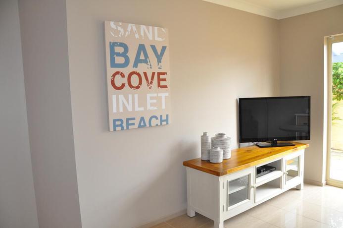 Imagen general del Hotel Marty's At Little Beach Apartments. Foto 17