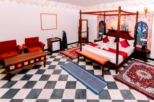 Imagen de la habitación del Hotel Marubhumi Luxury Resort. Foto 19