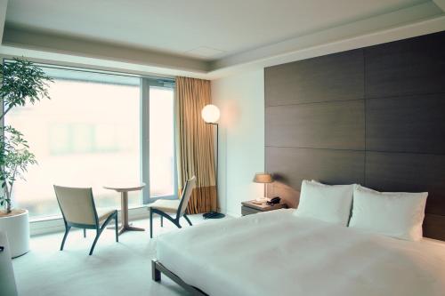 Imagen de la habitación del Hotel Marufukuro. Foto 11