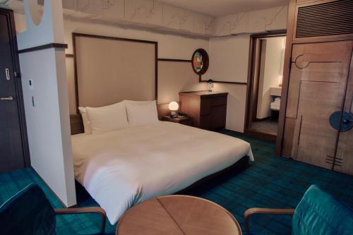 Imagen de la habitación del Hotel Marufukuro. Foto 16