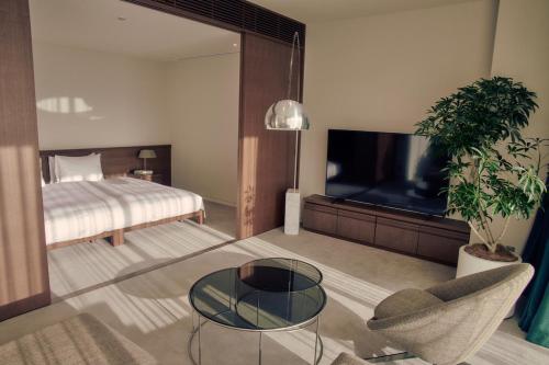 Imagen de la habitación del Hotel Marufukuro. Foto 18