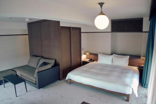 Imagen de la habitación del Hotel Marufukuro. Foto 19