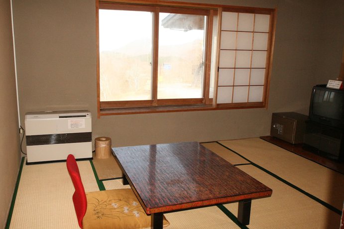 Imagen de la habitación del Hotel Maruike. Foto 13