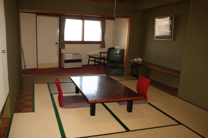 Imagen de la habitación del Hotel Maruike. Foto 14