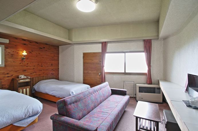 Imagen de la habitación del Hotel Maruike. Foto 16