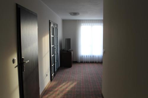 Imagen de la habitación del Hotel Marusza. Foto 10
