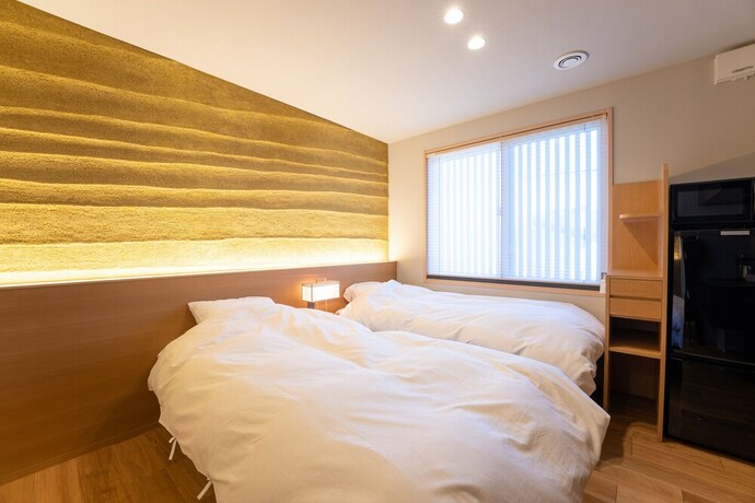 Imagen de la habitación del Hotel Marutto Ishikawa. Foto 28