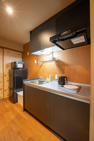 Imagen de la habitación del Hotel Marutto Ishikawa. Foto 31
