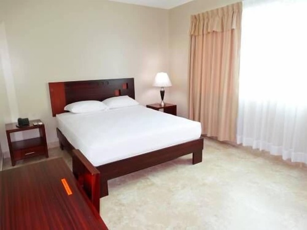 Imagen de la habitación del Hotel Marvento Suites. Foto 20
