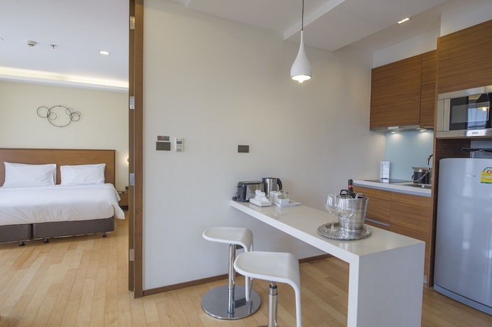 Imagen de la habitación del Hotel Marvin Suites. Foto 10